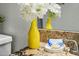 The bathroom features stylish accents and granite counters at 7625 E Camelback Rd # A114, Scottsdale, AZ 85251