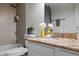 Bathroom features a shower/tub combination and granite counters at 7625 E Camelback Rd # A114, Scottsdale, AZ 85251