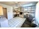 Bonus room with tiled floors, built-in cabinets, and a ceiling fan at 8552 E Vía Del Palacio --, Scottsdale, AZ 85258
