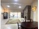 Open dining room with stone fireplace and sliding door access to an outdoor patio at 8552 E Vía Del Palacio --, Scottsdale, AZ 85258