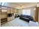 Living room featuring custom built-in shelving, desk, neutral color palette, and plenty of natural light at 8552 E Vía Del Palacio --, Scottsdale, AZ 85258