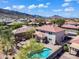 Home with pool and a hot tub, surrounded by landscaped yards in a lovely neighborhood at 8817 S 13Th Way, Phoenix, AZ 85042