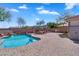 Expansive backyard showcasing a pool, patio, and landscaped surroundings for outdoor enjoyment at 8817 S 13Th Way, Phoenix, AZ 85042