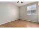 Bedroom features hardwood floors, a window, and natural light at 9511 E Kiva Ave, Mesa, AZ 85209