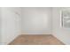 Bright bedroom with closet and window, providing natural light and ample storage space at 9555 E Raintree Dr # 1018, Scottsdale, AZ 85260