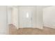 Bright entryway with a white front door and neutral tile flooring at 9555 E Raintree Dr # 1018, Scottsdale, AZ 85260