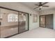 Open patio with sliding glass doors, seamlessly blending indoor and outdoor living spaces at 9555 E Raintree Dr # 1018, Scottsdale, AZ 85260