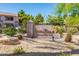 Community sign with lush landscaping, welcoming residents and visitors to Ladera Vista II at 9555 E Raintree Dr # 1018, Scottsdale, AZ 85260