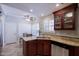 Modern kitchen featuring granite countertops and stainless steel appliances at 10017 E Mountain View Rd # 1087, Scottsdale, AZ 85258