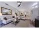Cozy living room space that opens to the dining and kitchen areas at 10017 E Mountain View Rd # 1087, Scottsdale, AZ 85258
