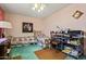 Shared bedroom with twin beds, work space, and plenty of storage at 11012 W Caron Dr, Sun City, AZ 85351