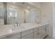 Bathroom vanity with dual sinks and plenty of counter space at 11300 N Casa Dega N Dr # 1047, Surprise, AZ 85388