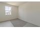Carpeted bedroom with lots of natural light from a large window at 11300 N Casa Dega N Dr # 1047, Surprise, AZ 85388