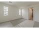 Sunny bedroom with carpet flooring, modern windows and neutral paint at 11300 N Casa Dega N Dr # 1047, Surprise, AZ 85388