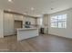 Kitchen view featuring white cabinets and stainless steel appliances at 11300 N Casa Dega N Dr # 1047, Surprise, AZ 85388