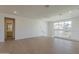 Bright open space with hardwood floors and large windows providing ample natural light at 11300 N Casa Dega N Dr # 1047, Surprise, AZ 85388