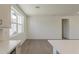Spacious and bright living room with hardwood floors and a view of the kitchen at 11300 N Casa Dega N Dr # 1047, Surprise, AZ 85388