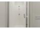 The frameless shower boasts sleek fixtures, a rain shower head, and is easy to clean at 11300 N Casa Dega N Dr # 1047, Surprise, AZ 85388