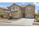 Charming two-story home with desert landscaping, attached two-car garage, and inviting curb appeal at 11959 W Vernon Ave, Avondale, AZ 85392