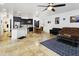 Open living space with dining area, kitchen island, and a cozy seating area at 11959 W Vernon Ave, Avondale, AZ 85392