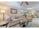 Cozy living room features plush furniture and a neutral color palette at 14300 W Bell Rd # 58, Surprise, AZ 85374