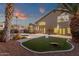 Expansive backyard showcasing a pool, lush green space, and inviting patio area for relaxation and entertainment at 14823 S 13Th Pl, Phoenix, AZ 85048