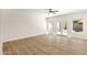 Bright bedroom with neutral tones, wood-look floors, with backyard access at 14823 S 13Th Pl, Phoenix, AZ 85048