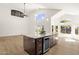 Spacious kitchen with granite countertops, stainless steel appliances, large island, and natural light at 14823 S 13Th Pl, Phoenix, AZ 85048