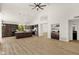 Open kitchen featuring stainless steel appliances, granite countertops, and a large island at 14823 S 13Th Pl, Phoenix, AZ 85048