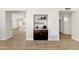 Detailed shot of a wet bar built into the wall between living spaces in the house at 14823 S 13Th Pl, Phoenix, AZ 85048