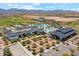 Aerial view of community pools, clubhouse, community center, and meticulous landscaping in a premier Primary planned community at 17332 W Wildwood St, Surprise, AZ 85388