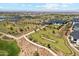 A lush green Primary planned community with ponds, landscaping, walking paths, and common areas at 17332 W Wildwood St, Surprise, AZ 85388