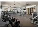 Spacious gym equipped with modern cardio and weight training machines at 17332 W Wildwood St, Surprise, AZ 85388