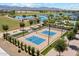 Aerial view of the pickleball court showing court layout and the picturesque golf course lake beyond at 17332 W Wildwood St, Surprise, AZ 85388