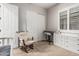 Comfortable Bedroom featuring a rocking chair and a closet space at 19571 E Strawberry Dr, Queen Creek, AZ 85142