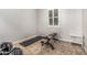 Home gym setup with adjustable bench and weights for a complete workout experience at 19571 E Strawberry Dr, Queen Creek, AZ 85142