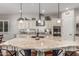 Large kitchen island with bar seating and a modern design, great for entertaining guests at 19571 E Strawberry Dr, Queen Creek, AZ 85142