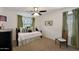 Bright bedroom with a window and decorative furniture and decor at 20563 W White Rock Rd, Buckeye, AZ 85396