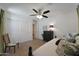 Bright bedroom features an accent chair and decor at 20563 W White Rock Rd, Buckeye, AZ 85396