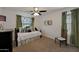 Bright bedroom with a window and decorative furniture and decor at 20563 W White Rock Rd, Buckeye, AZ 85396