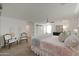 Comfortable main bedroom with carpet, furnishings and a barn door at 20563 W White Rock Rd, Buckeye, AZ 85396