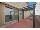 Outdoor patio area featuring a pergola providing shade and a seamless transition from indoor to outdoor living at 20563 W White Rock Rd, Buckeye, AZ 85396