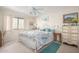Cozy bedroom with white furniture, a ceiling fan, carpet flooring, and lots of natural light at 2277 N Recker Rd # 6, Mesa, AZ 85215