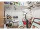 Walk-in closet containing storage items, assorted hangers, pillows, cleaning supplies, and personal items at 2277 N Recker Rd # 6, Mesa, AZ 85215