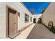 Spacious courtyard featuring a covered walkway with views into the community at 2277 N Recker Rd # 6, Mesa, AZ 85215