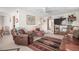 Cozy living room featuring comfortable recliners, sofa, and decorative rug at 2277 N Recker Rd # 6, Mesa, AZ 85215