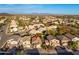 An aerial view showcases this desert home, situated in a well-planned community with mountain views at 23005 N 19Th Way, Phoenix, AZ 85024