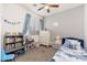 A decorated bedroom with blue accents and a cozy atmosphere for rest and play at 23005 N 19Th Way, Phoenix, AZ 85024