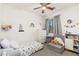 A bedroom featuring modern furniture and whimsical decorations for a playful space at 23005 N 19Th Way, Phoenix, AZ 85024