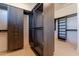 Spacious walk-in closet with custom shelving and ample storage for an organized wardrobe at 23656 N 123Rd St # 240, Scottsdale, AZ 85255